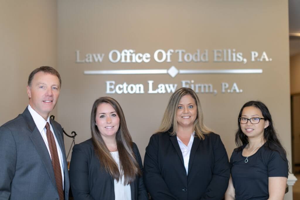 0O1A7729-1024x683 Attorneys and staff at Ecton Law Firm, P.A., providing legal services.
